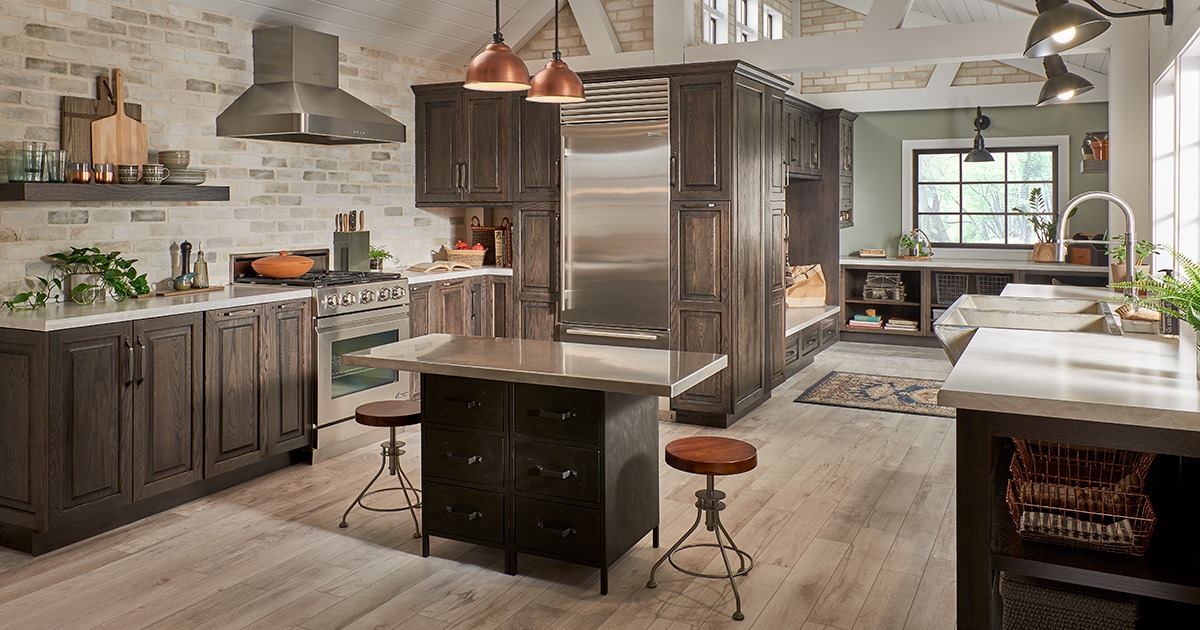 Modern kitchen renovation in Arlington VA by Optima Kitchen and Bath featuring white shaker cabinets, quartz countertops, and subway tile backsplash